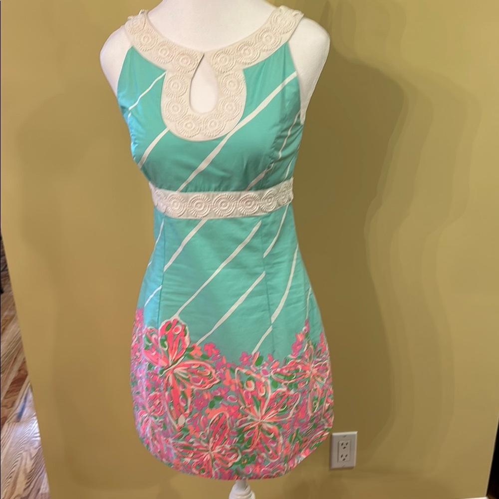 Elegant Mint Green Dress with Floral Accents